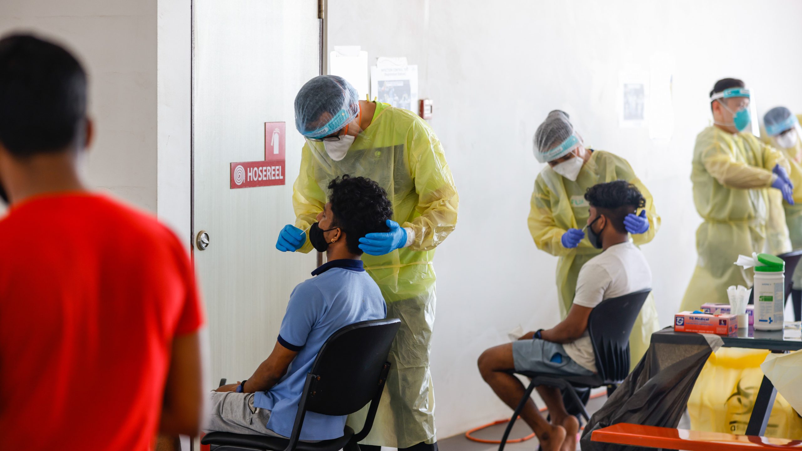 In Pics: Singapore pilots antigen rapid tests for migrant workers
