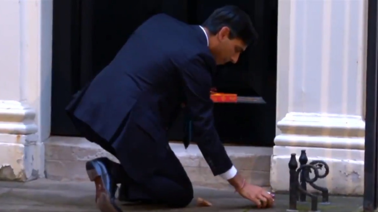 UK Chancellor of the Exchequer Rishi Sunak lights Diwali ‘diyas’ on Downing Street doorstep