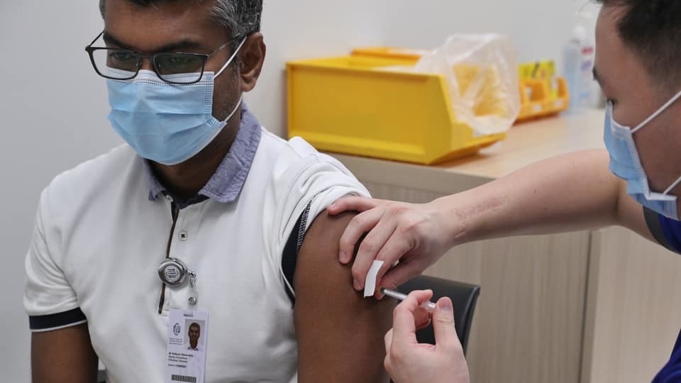 Singapore begins COVID-19 vaccination with first batch of healthcare workers at NCID