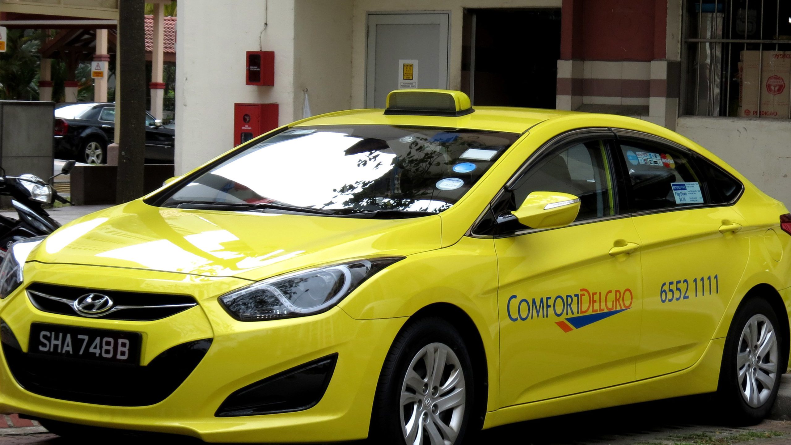 Singapore begins vaccination drive for 50,000 cab, rideshare drivers
