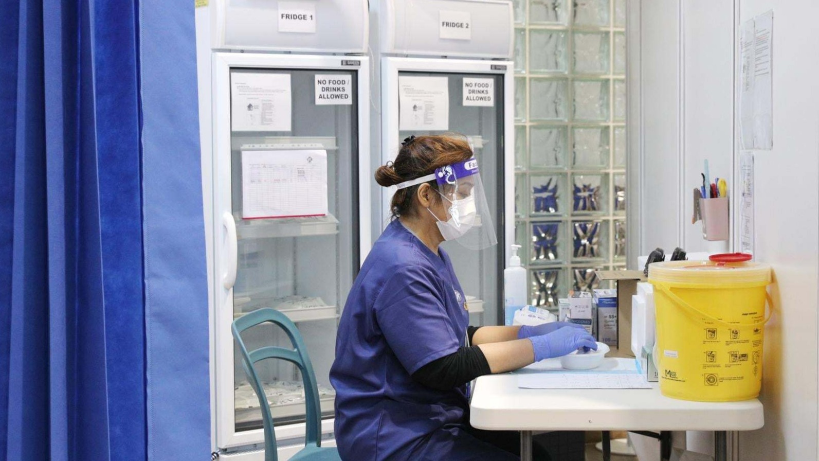 Singapore extends COVID-19 vaccination to essential services personnel and high risk groups