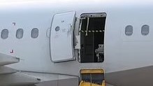 WATCH: Passenger opens plane’s emergency exit door midair