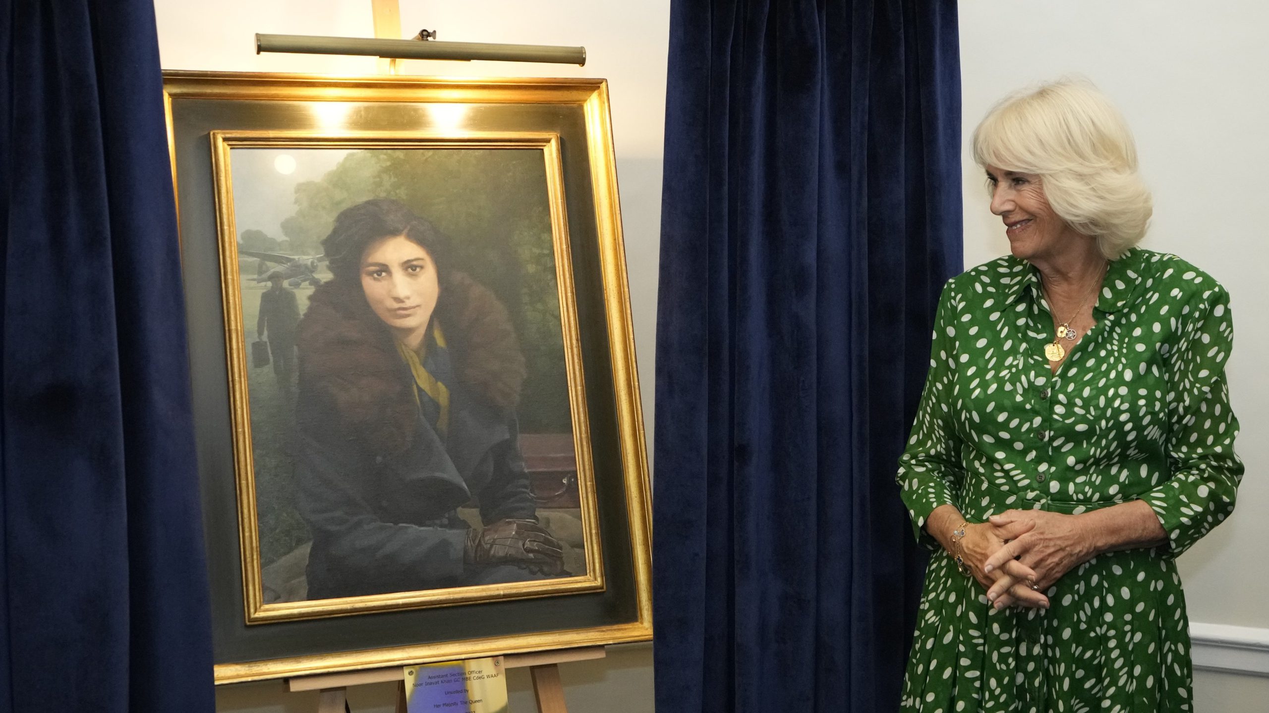Queen Camilla unveils portrait of British Indian spy Noor Inayat Khan at the Royal Air Force Club