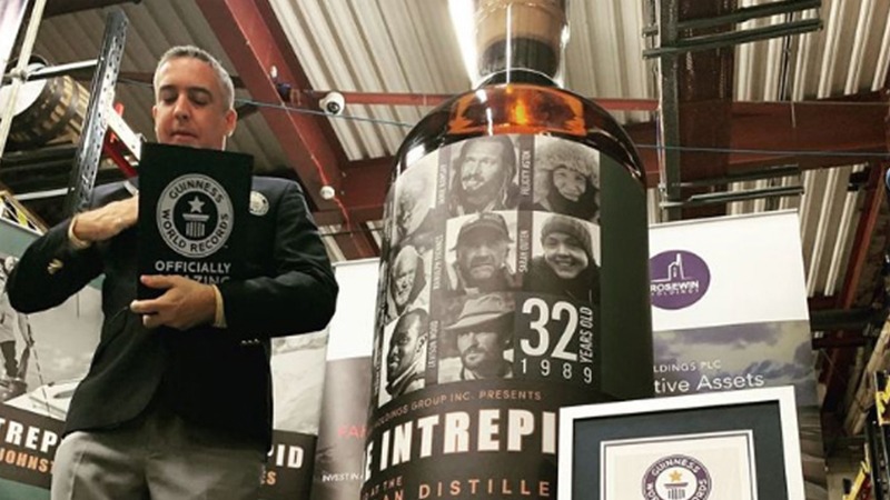 15 months after auction, anonymous buyer of world’s largest whisky bottle finally revealed