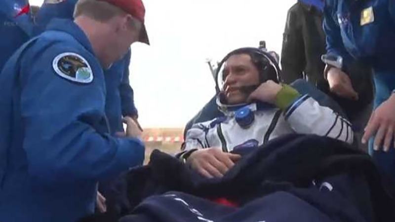 Russian-US join team return to Earth after a year in space