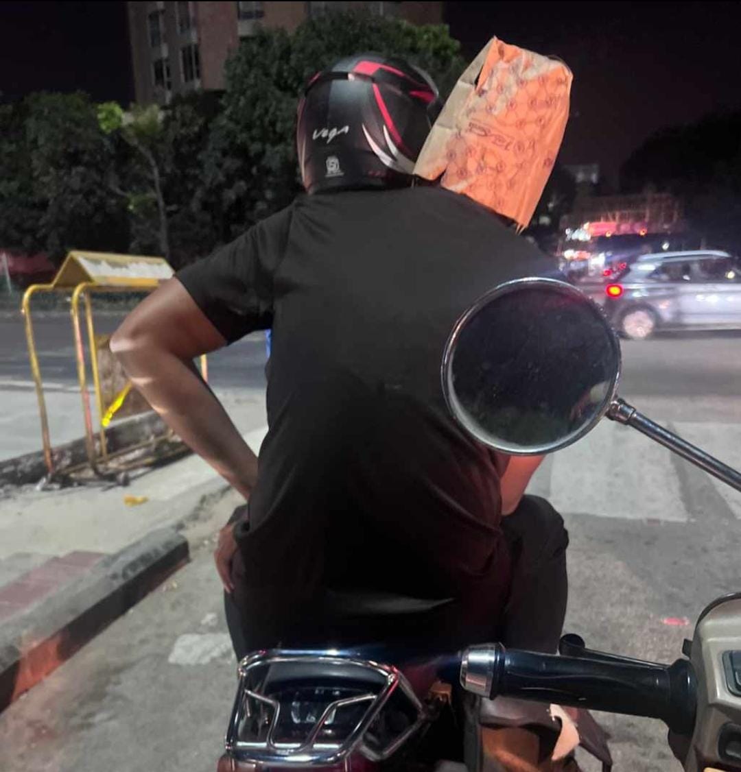 VIRAL: Safety goes for a toss as pillion rider prefers paper bag over traditional helmet in Bangalore