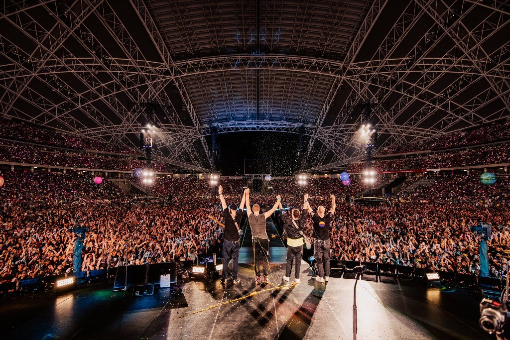 Two dozen songs, technical snags and an impromptu rendition mark Coldplay’s first night in Singapore