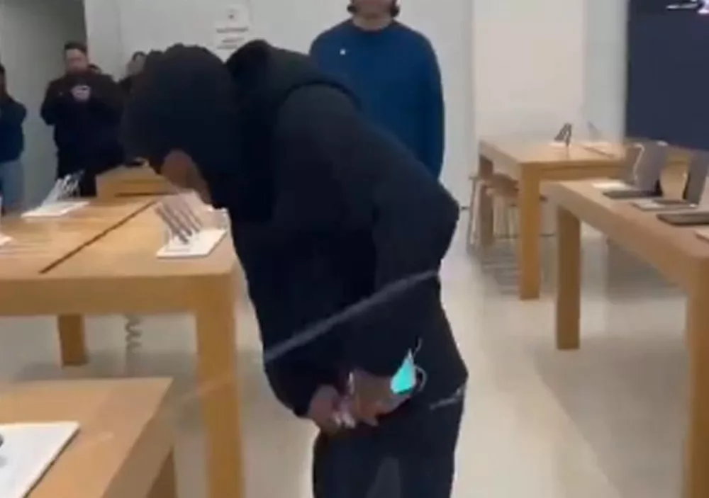 Man robs 50 iPhone from California store. 