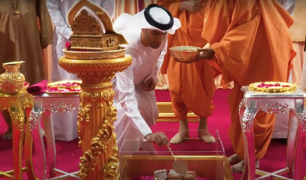 One of the Arab dignitaries is guided by BAPS monks at the Hindu mandir Shilanyas in Abu Dhabi in 2019. Screenshot courtesy:  YouTube/BAPS UAE