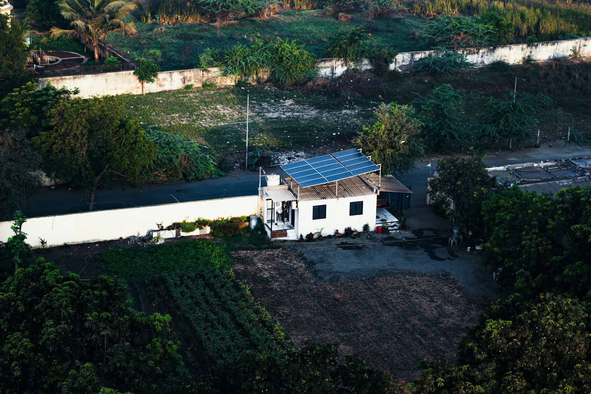 A household in western India's Gujarat is using solar panel to generate electricity. Photo credit: Unsplash.