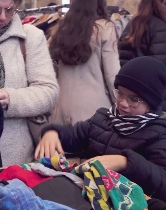 Young buyer at fashion sale