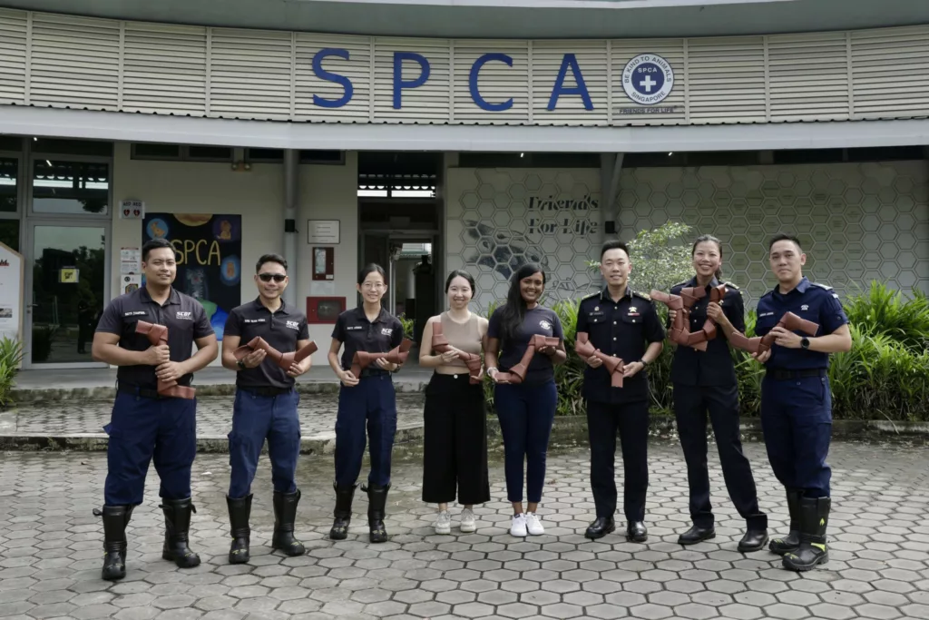 Singapore Civil Defence Force donates dog toys to SPCA