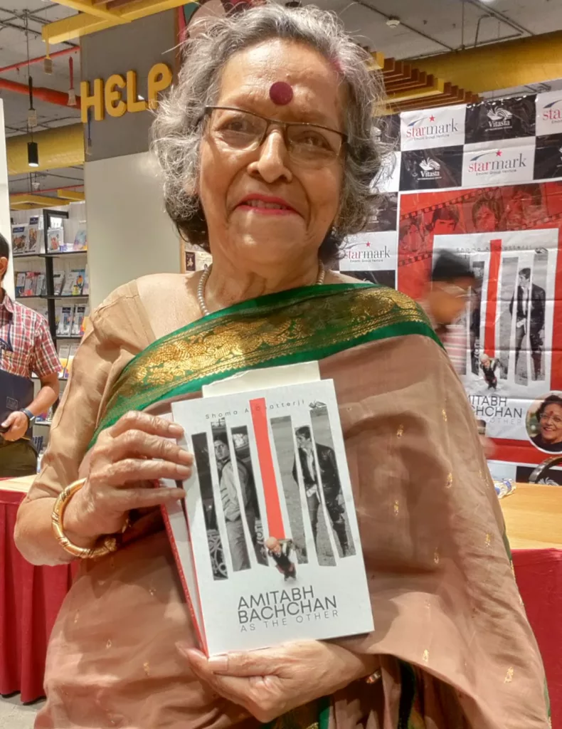 Film scholar Dr Shoma A Chatterji, with her book on Amitabh Bachchan