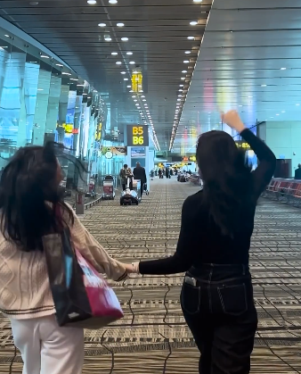 Duty-free shoppers at Singapore Changi Airport