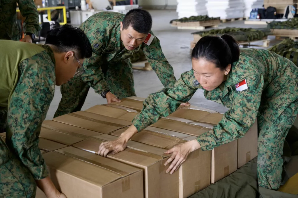 Singapore Air Force mission crew packing Gaza aid