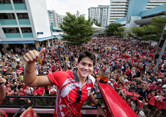 Singapore swimmer Joseph Schooling greeted by the public