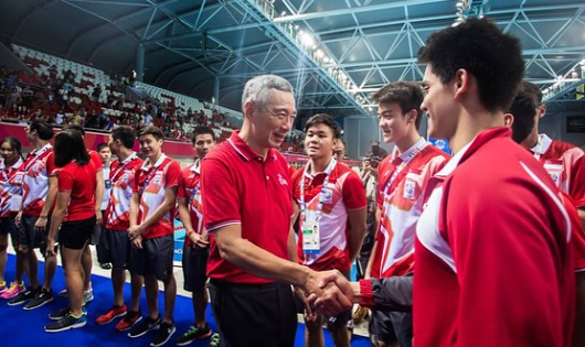 Singapore swimmer Joseph Schooling with Singapore Prime Minister Lee Hsien Loong