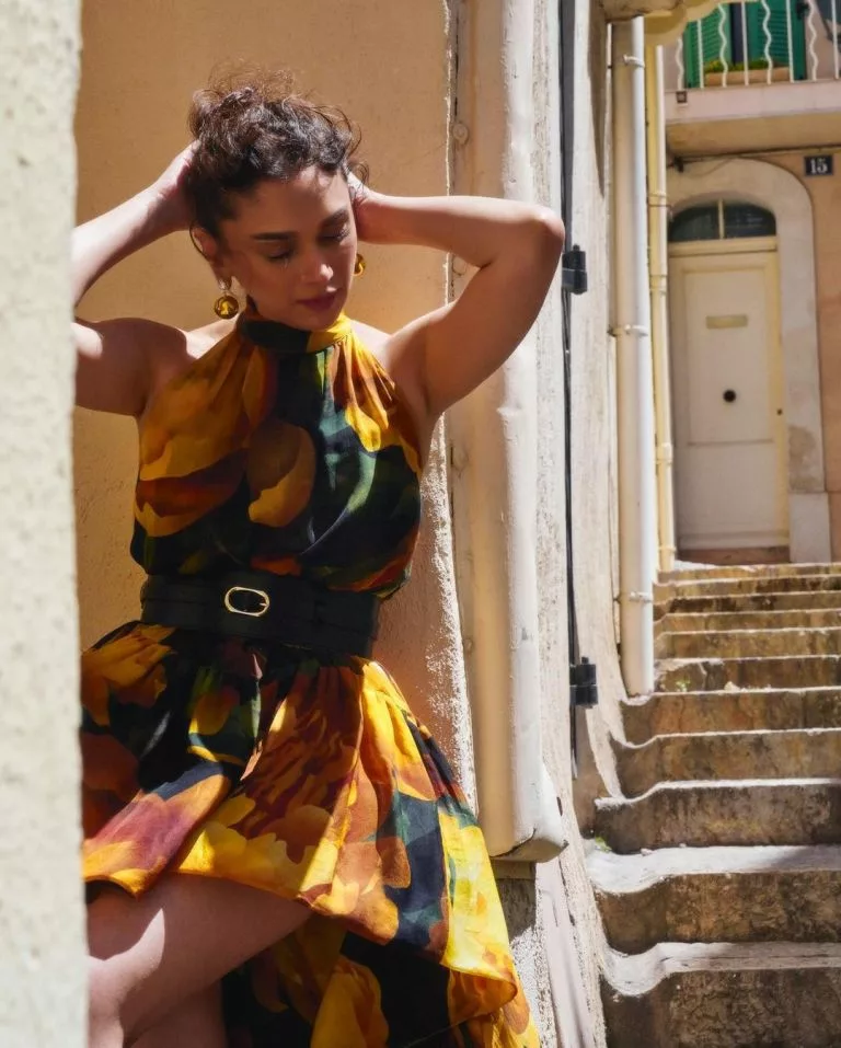 The vibrant dress features yellow floral prints. Photo courtesy: Aditi Rao Hydari/Instagram