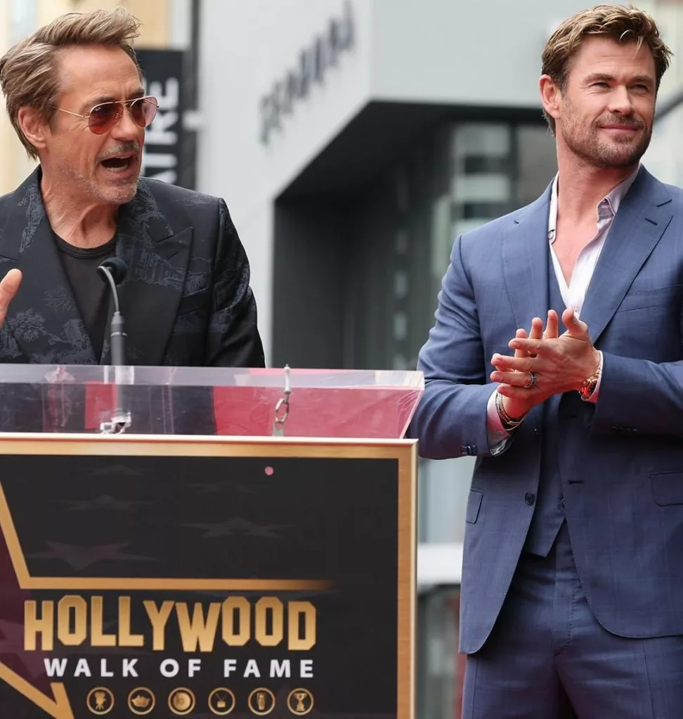 Robert Downey Jr (left) speaking at the event as Chris Hemsworth applauds. Photo courtesy: Chris Hemsworth/Instagram
