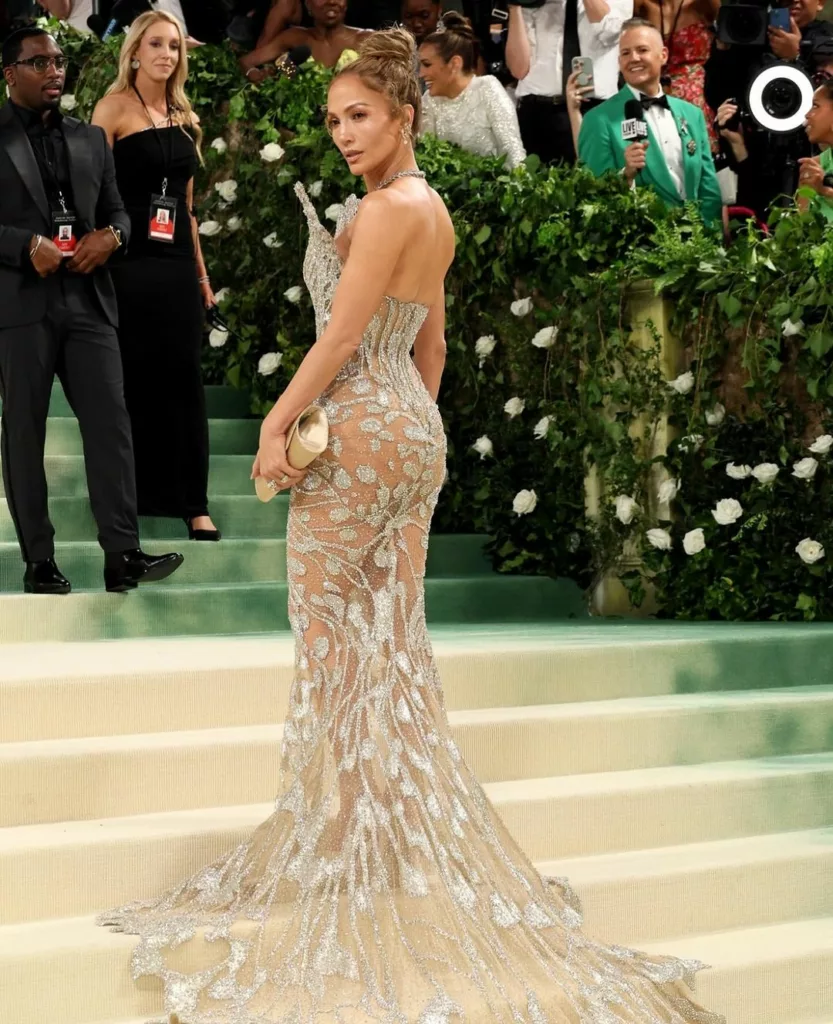 Jennifer Lopez flaunting her near-see-through Schiaparelli dress with a casual top knot. Photo courtesy: Jennifer Lopez/Instagram