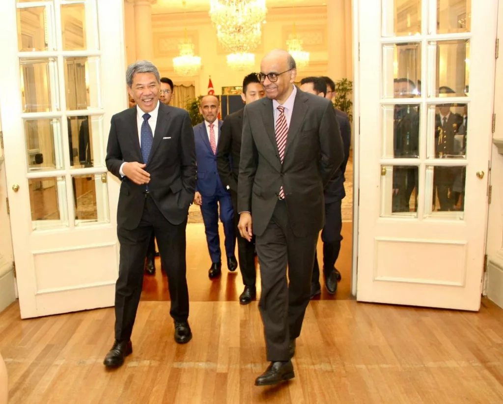 Malaysian Foreign Minister Mohamad bin Haji Hasan with Singapore President Tharman Shanmugaratnam