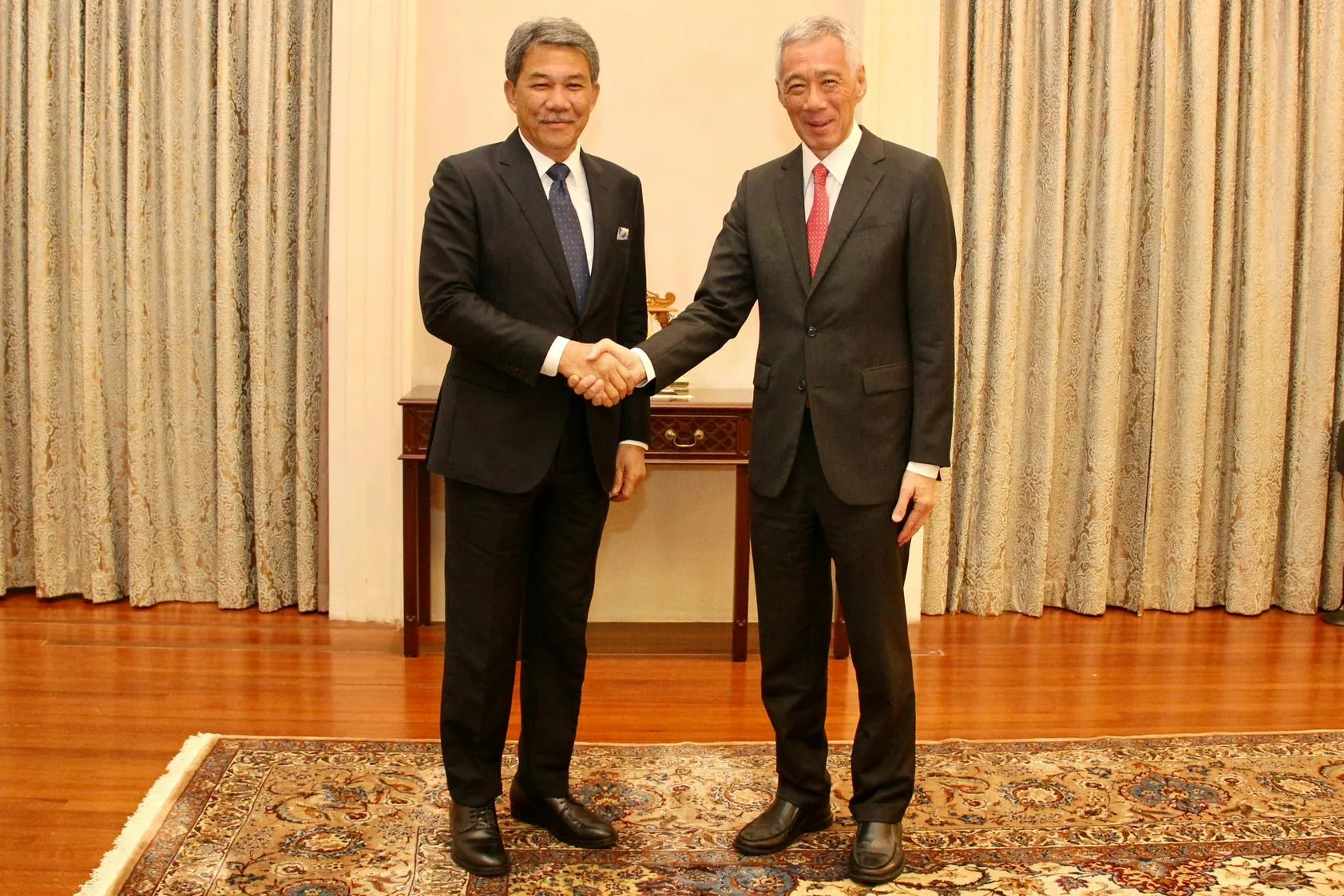 Malaysian Foreign Minister Mohamad bin Haji Hasan with Singapore Senior Minister and former PM Lee Hsien Loong