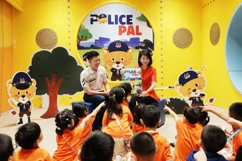 MOS Sun Xueling reading to students from My First Skool Havelock