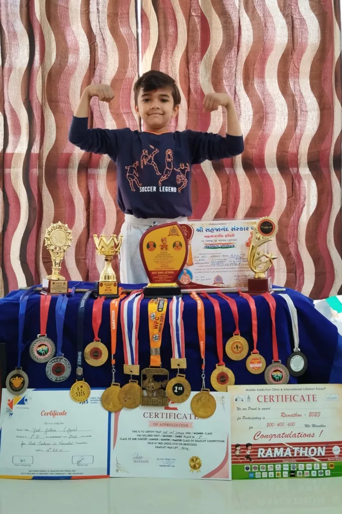Yati with his medals and certificates. Photo courtesy: Family