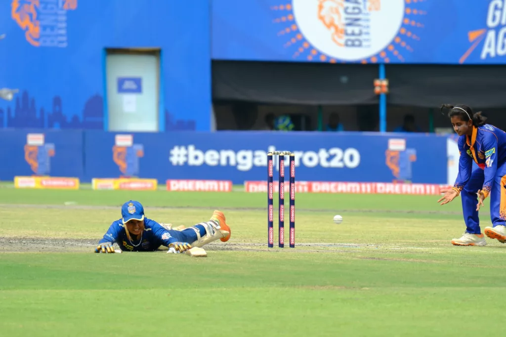 A Lux Shyam Kolkata Tigers batter diving to save herself from a runout against Adamas Howrah Warriors on June 13. Photo courtesy: Collected