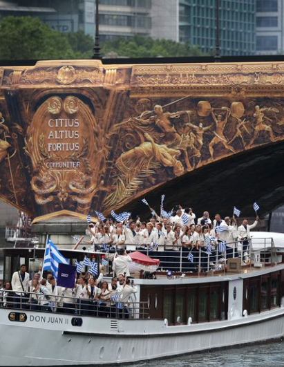 Team Greece opens the parade down the Seine at the Paris Olympics 2024