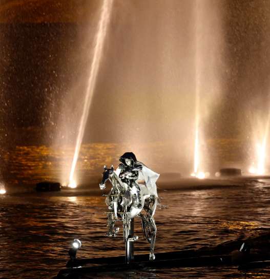 A mechanical horse and its rider galloping on the Seine, at the Paris Olympics 2024 opening ceremony