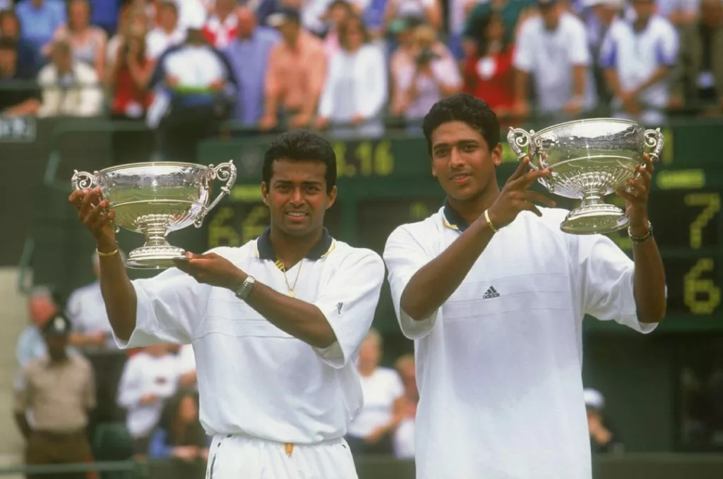 Leander (left) and Mahesh pose with their Men's Doubles trophies at Wimbledon. Photo courtesy: www.instagram.com/leanderpaes