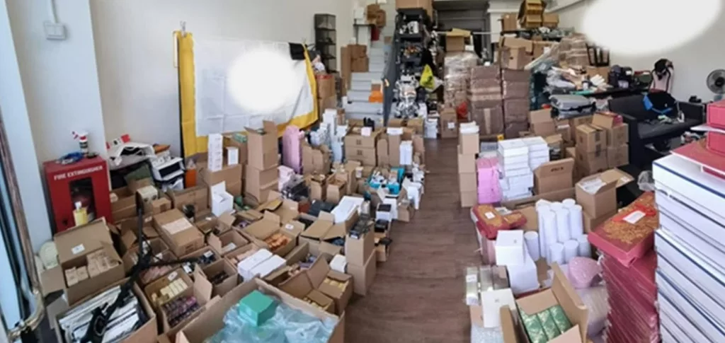 Seized counterfeit goods. Photo: Singapore Police Force