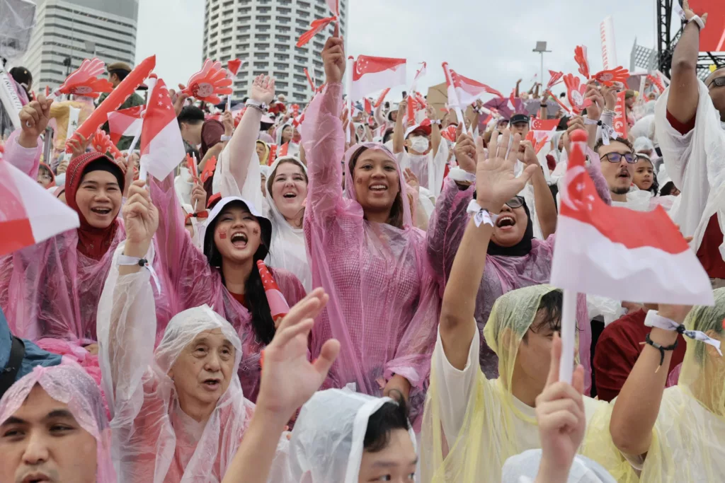 People celebrate at the Singapore National Day Parade 2024