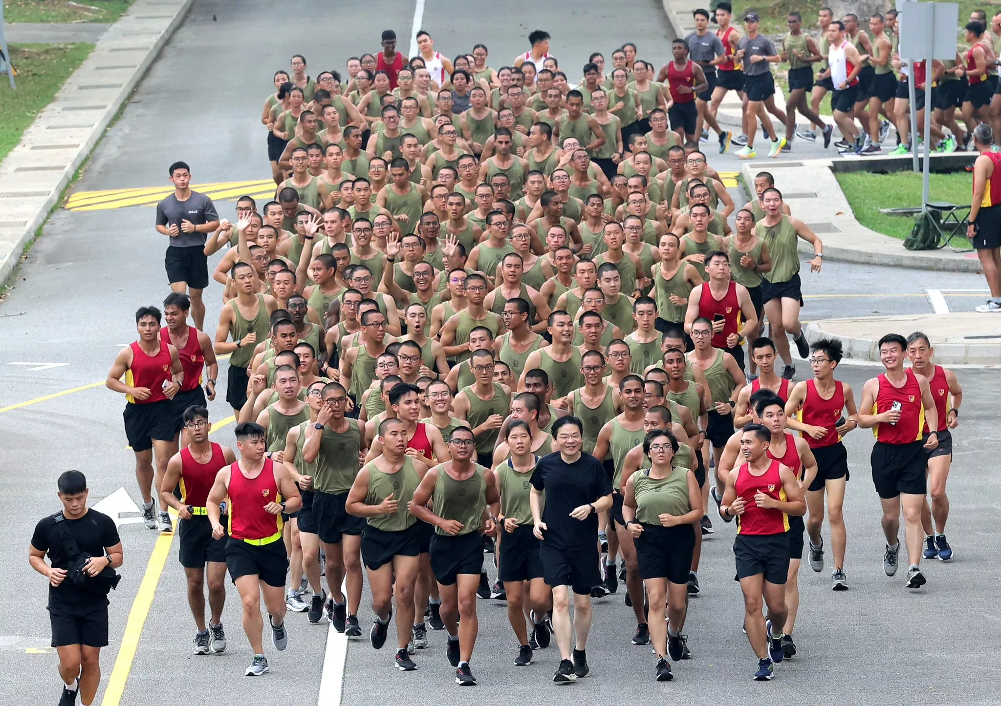PM Wong runs with SAF recruits and NS cadets, recalls how training helped him push limits