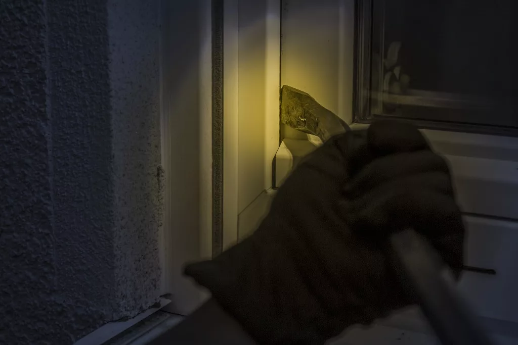 Representational image of a burglar trying to break into a house. Photo courtesy: Pixabay.