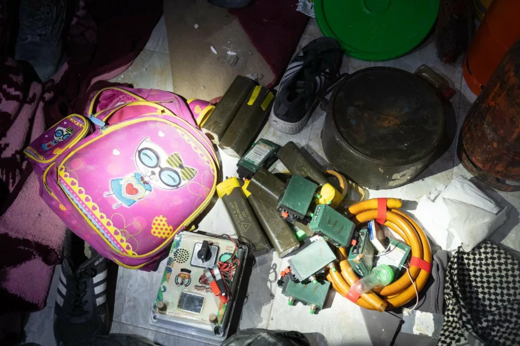 Israel Defense Forces release image of Palestine terrorist weapons found inside a school bag