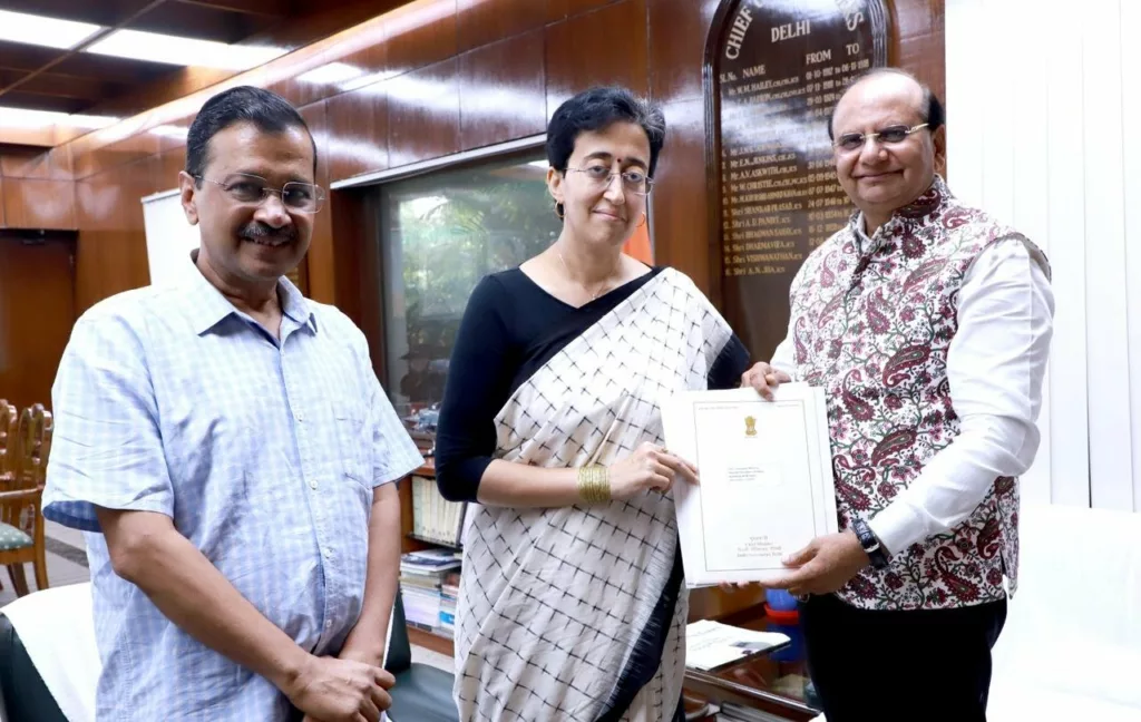 AAP leaders Arvind Kejriwal (left), Atishi (middle), with Delhi LG Saxena. Photo courtesy: x.com/AAPDelhi