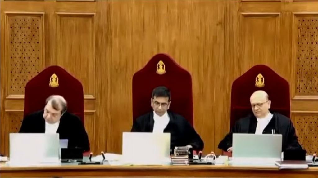 The Supreme Court bench comprising Chief Justice D Y Chandrachud (middle) and Justices J B Pardiwala (left) and Manoj Misra. Photo courtesy: Screengrab from www.youtube.com/@Firstpost