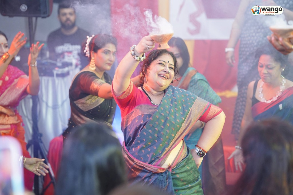 Dhunuchi Naach is an integral part of the Durga Puja. A participant showcases her moves during the event at SIPA Durga Puja 2023. Photo: Singapore Indian Puja Association