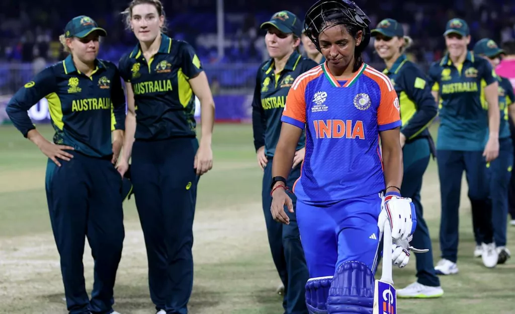 A dejected Harmanpreet Kaur walks back after getting dismissed against Australia. Photo courtesy: images.icc-cricket.com