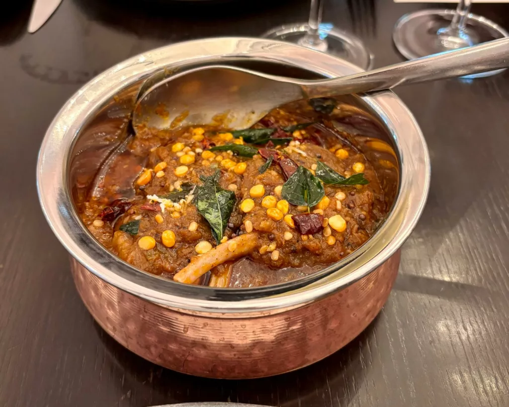 Erachi Ularthu, a main course featuring tender lamb chops