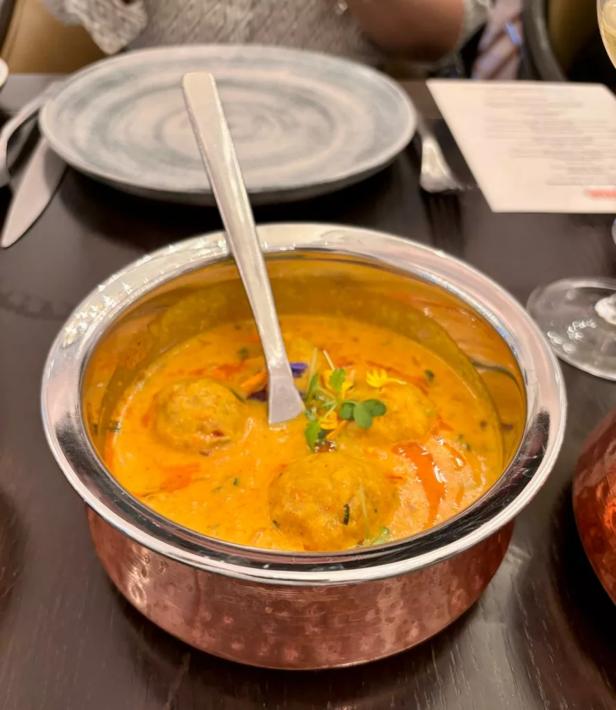 Govind Gatta Curry, a main dish of chickpea dumplings