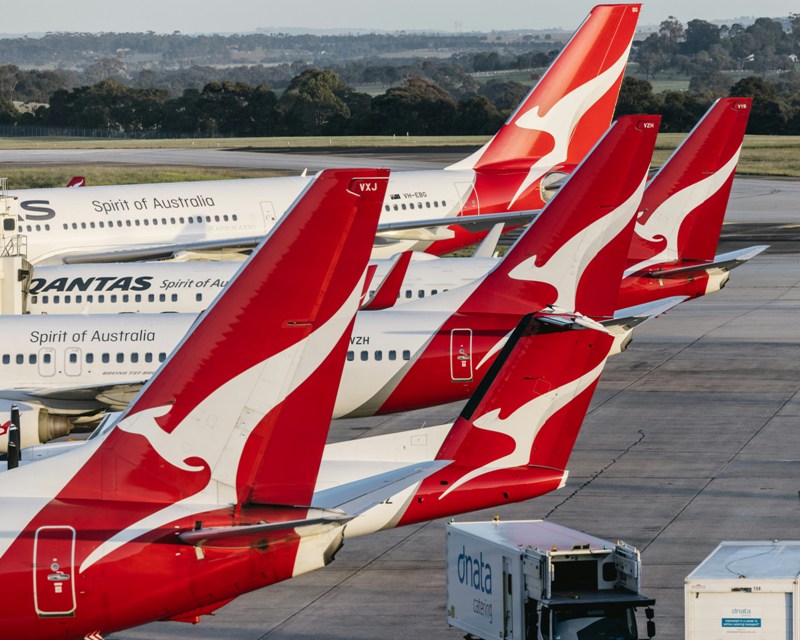 Qantas passengers left shocked after all flight screens play inappropriate R-rated movie. Passengers were travelling from Australia to Japan.