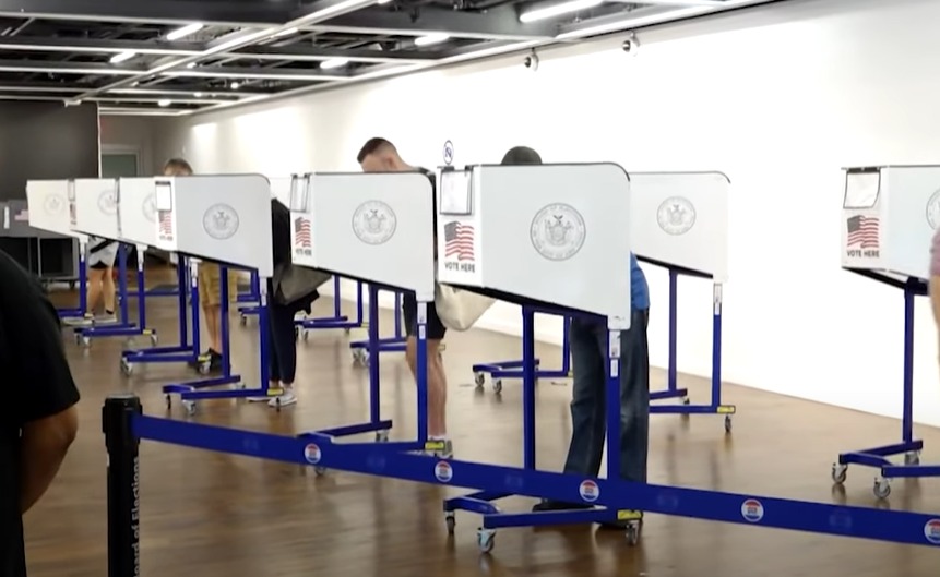 US voters exercising their rights at a polling booth. Photo courtesy: Screengrab from YouTube