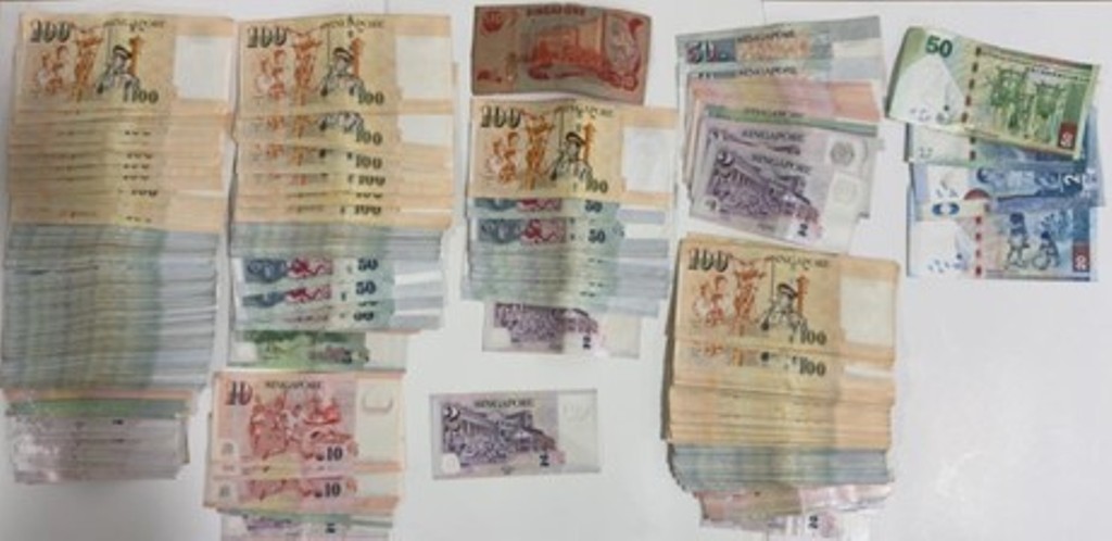 Cash seized as exhibit during anti-gambling operation in the vicinity of Yishun. Photo courtesy: www.police.gov.sg