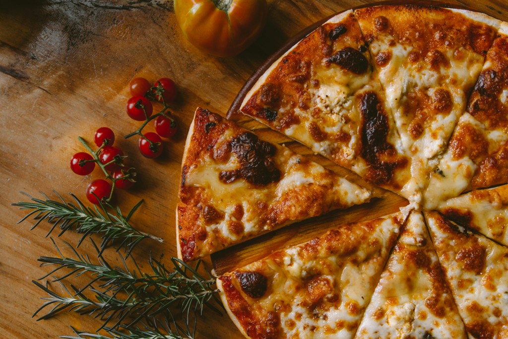 Pizza, an Italian dish, emerged as one of the most popular dishes in the world. Representational image. Photo courtesy: Unsplash
