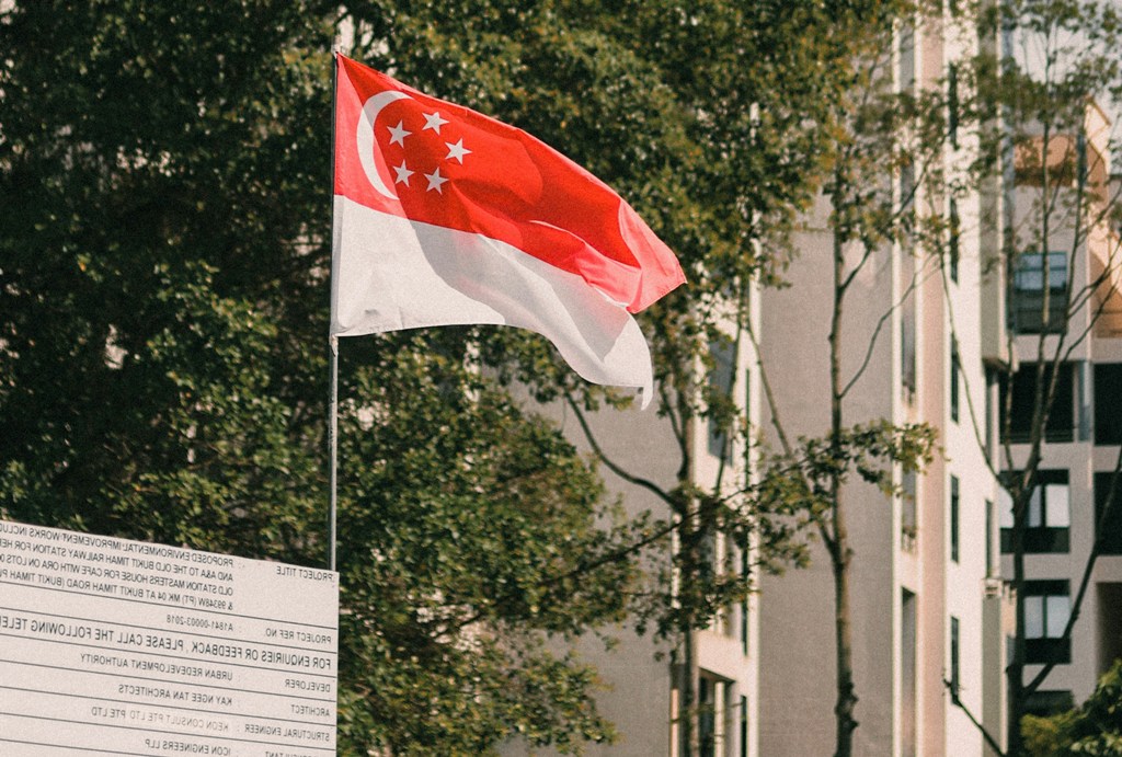 The MHA said it will not tolerate foreign political agendas on Singapore's soil. Representational image of Singapore's flag. Photo courtesy: Unsplash