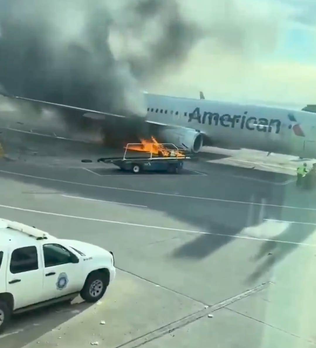 12 injured as American Airlines plane catches fire at Denver airport gate
