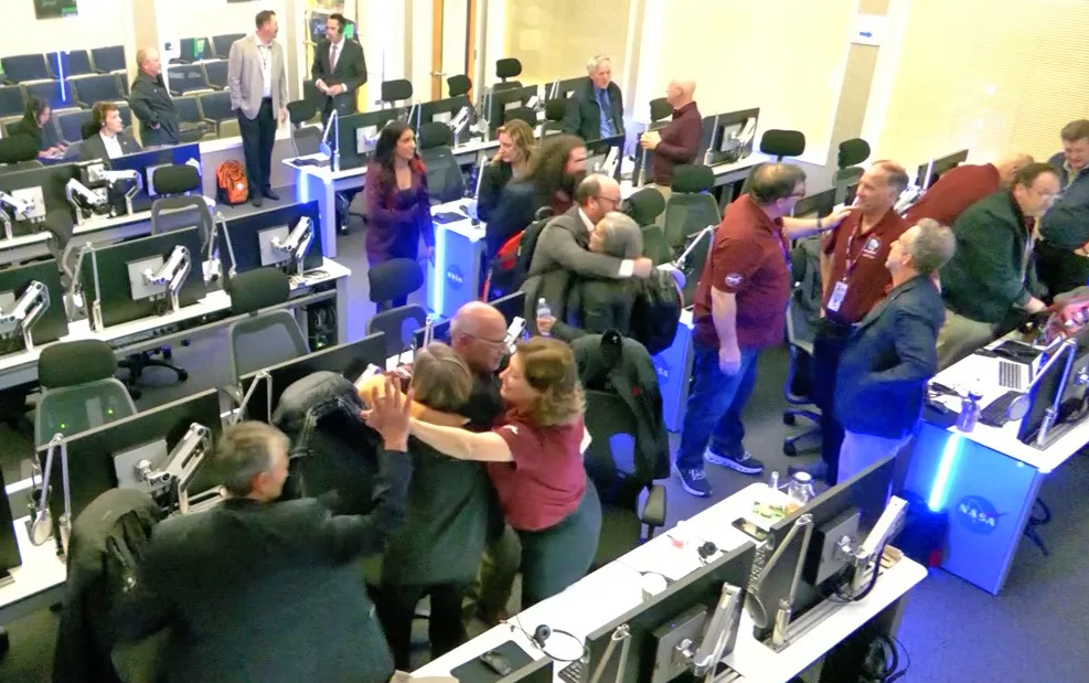 NASA’s SPHEREx mission controllers celebrate